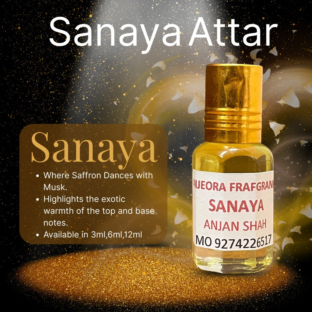 Anjeora Sanaya Attar in a glass bottle, featuring a chocolate amber wood fragrance with warm notes