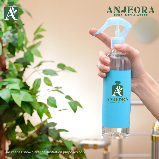 A hand holding an Anjeora perfume air freshener bottle with a blue label showcasing AQUA DI GIO perfume Air Freshener India