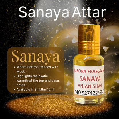 Anjeora Sanaya Attar in a glass bottle, featuring a chocolate amber wood fragrance with warm notes
